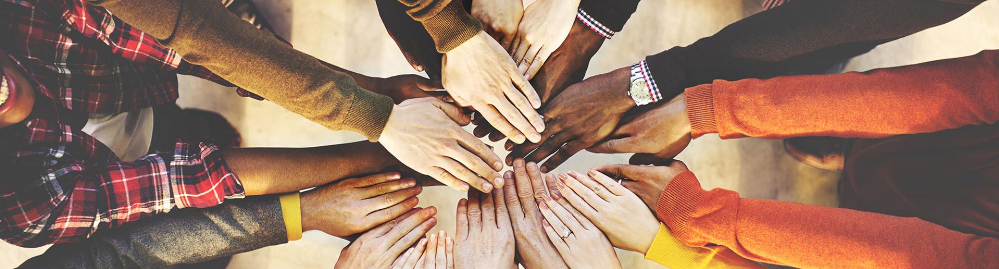 Hands meeting together.