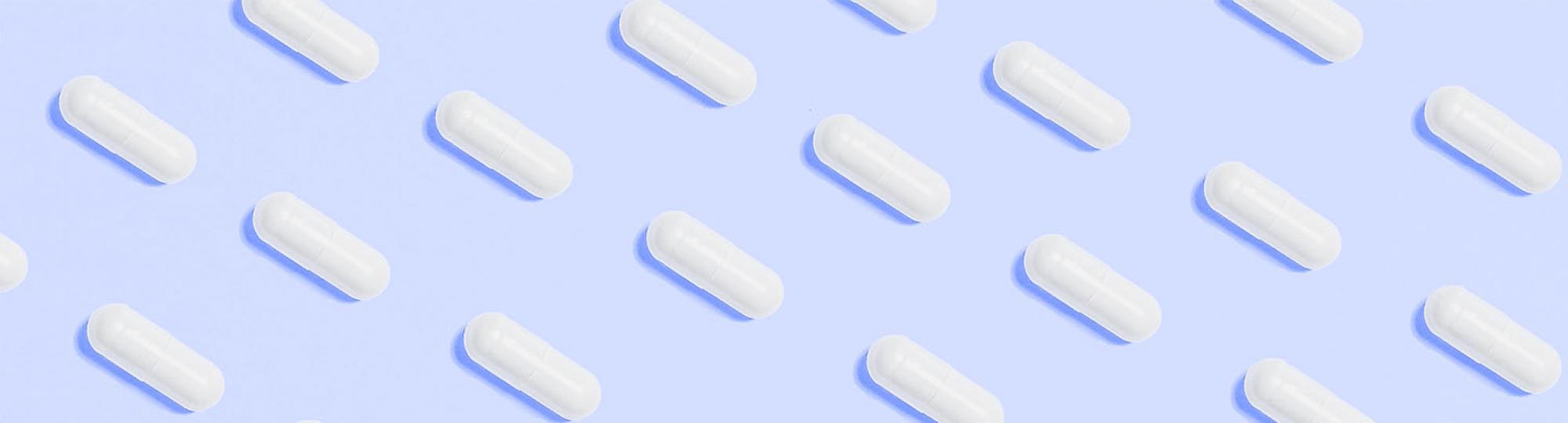 Decorative image of a row of tablets