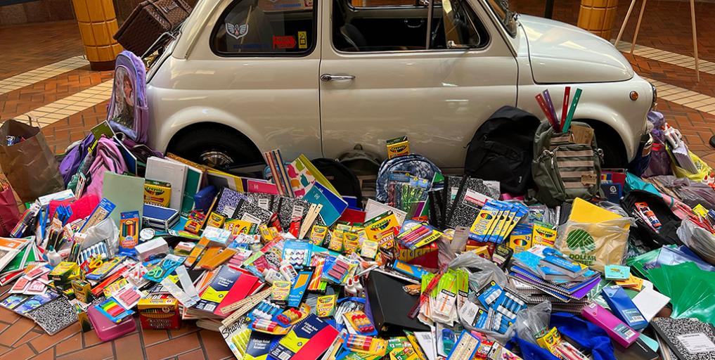 Fill the Fiat car surrounded by supplies