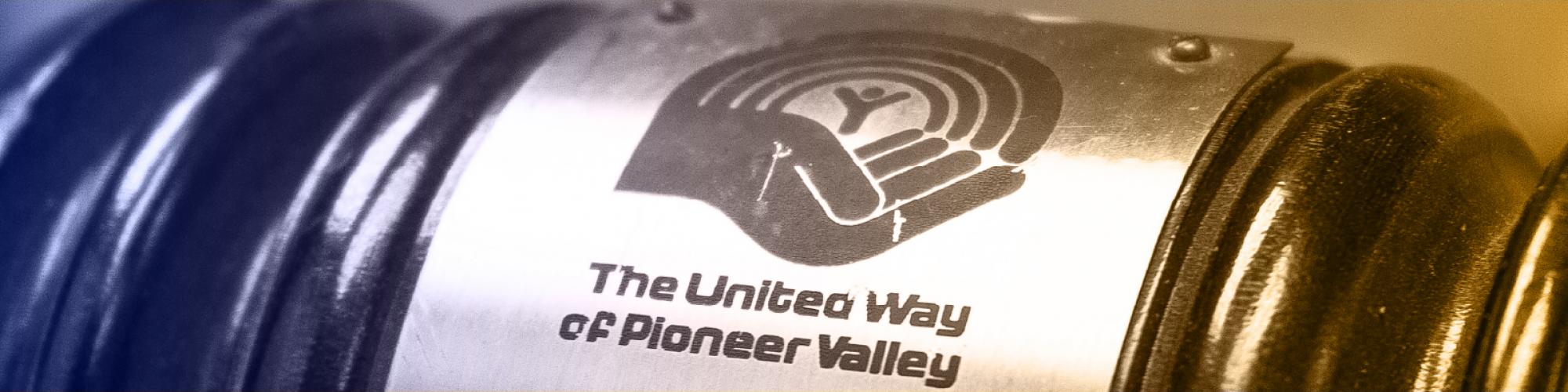 A gavel with the United Way of Pioneer Valley logo
