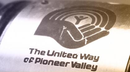 A gavel with the United Way of Pioneer Valley logo