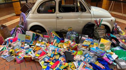 Fill the Fiat car surrounded by supplies